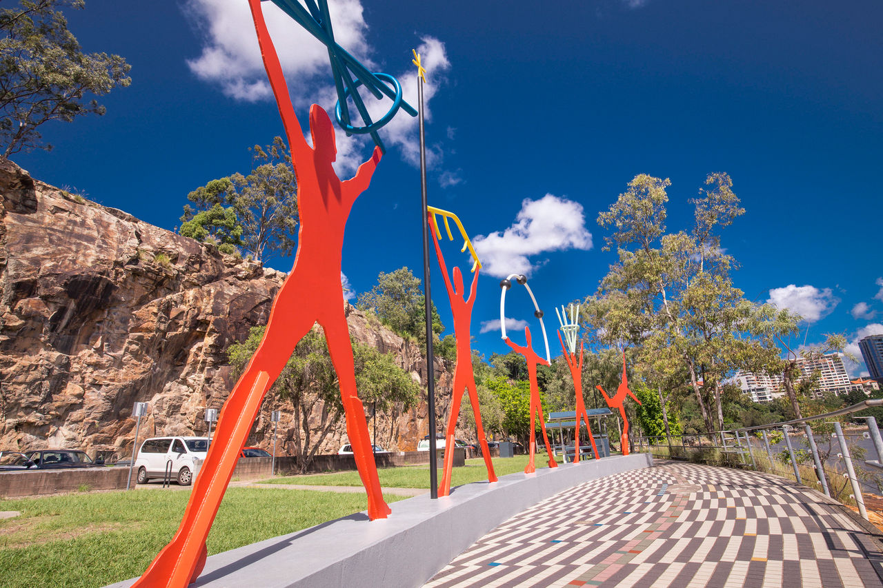 Side view of the daylight image of the metal artwork by the river, situated at Kangaroo Point Cliffs Boardwalk, Lower River Terrace.