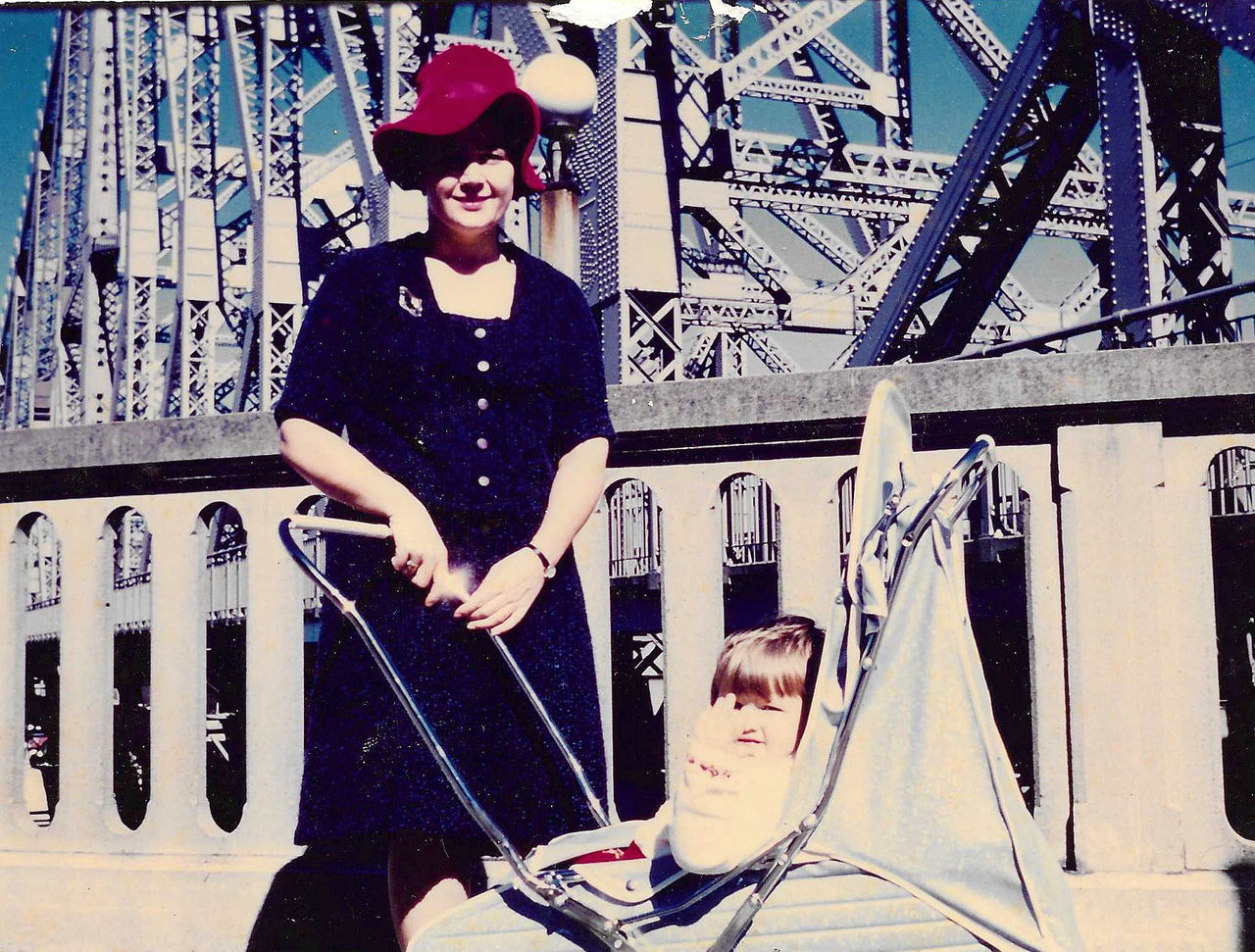 Share your Story: Irja shared a photo from her childhood in Brisbane, featuring herself and her mother in front of the Story Bridge in 1966. Photo courtesy of Irja Sinkko.